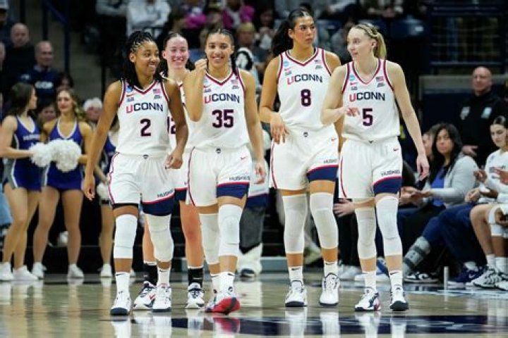 Connecticut Huskies: Who Are Hugh And Michele Millen? Cale Millen Parents Age Gap And Family Ethnicity
